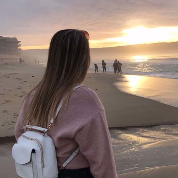 Student on the beach in california